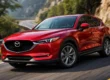 Mazda CX-5 em movimento destacando o design Kodo e rodas de liga leve em uma estrada sinuosa.